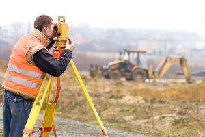 Land surveyor construction site